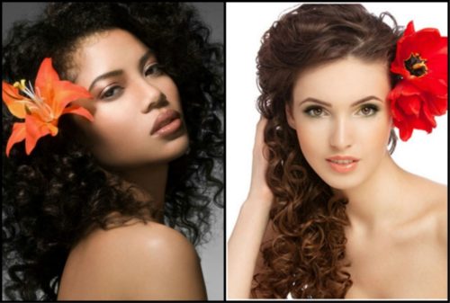 Flower accessorized curly hair hairstyles
