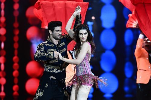 Bollywood actor Sushant Singh Rajput and actress Kriti Sanon perform during IIFA award 2017