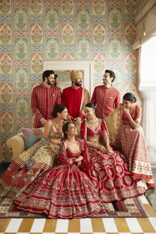 Anita Dongre red lehenga and Sherwani for Bride & Groom