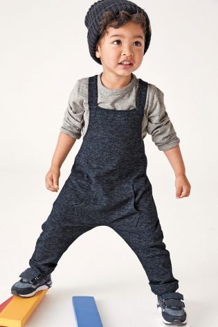 baby boy in dungarees