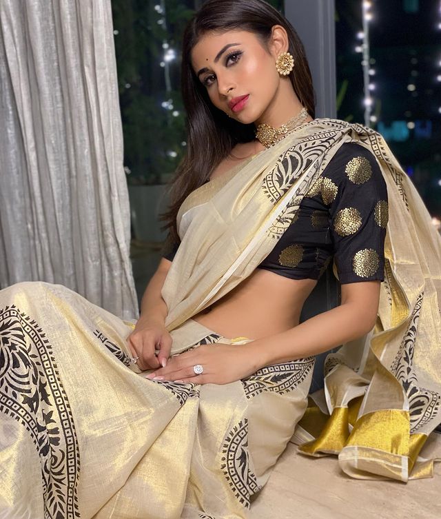 Mouni in cream saree for diwali 