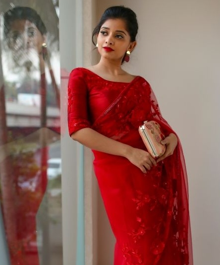 red saree with red blouse