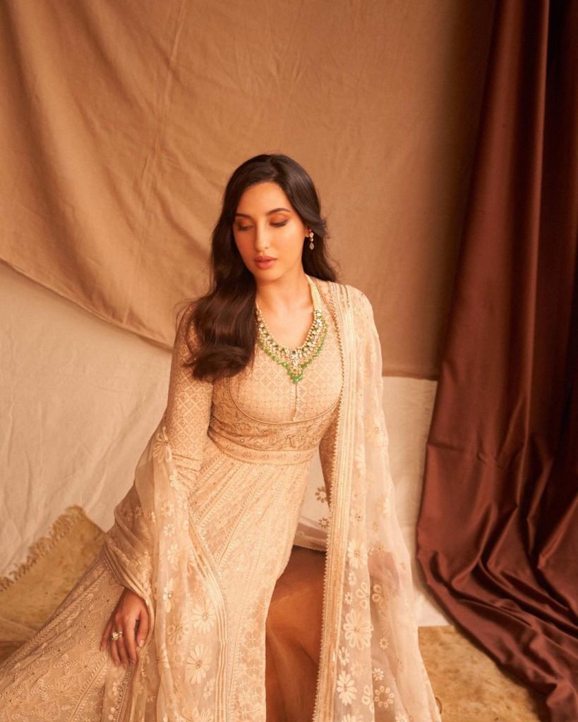 Nora Fatehi in ivory anarkali suit