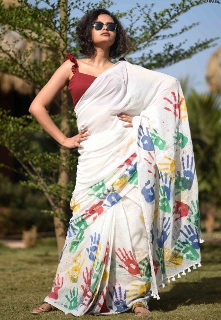 white based multihued saree as holi outfit ideas