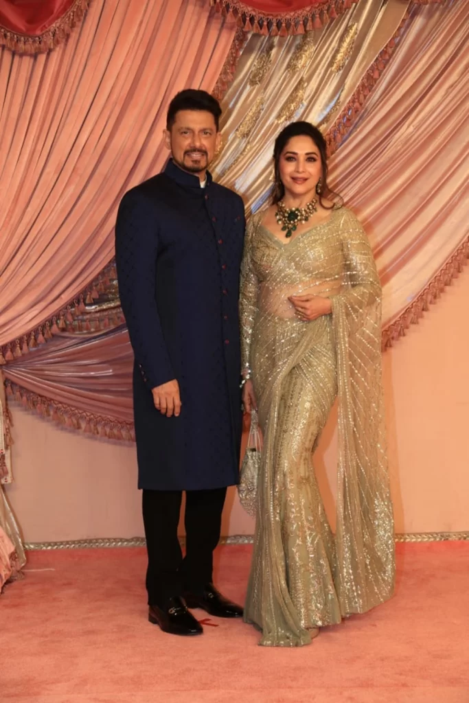 Madhuri Dixit in a Golden Net Saree in Pre-draped Style