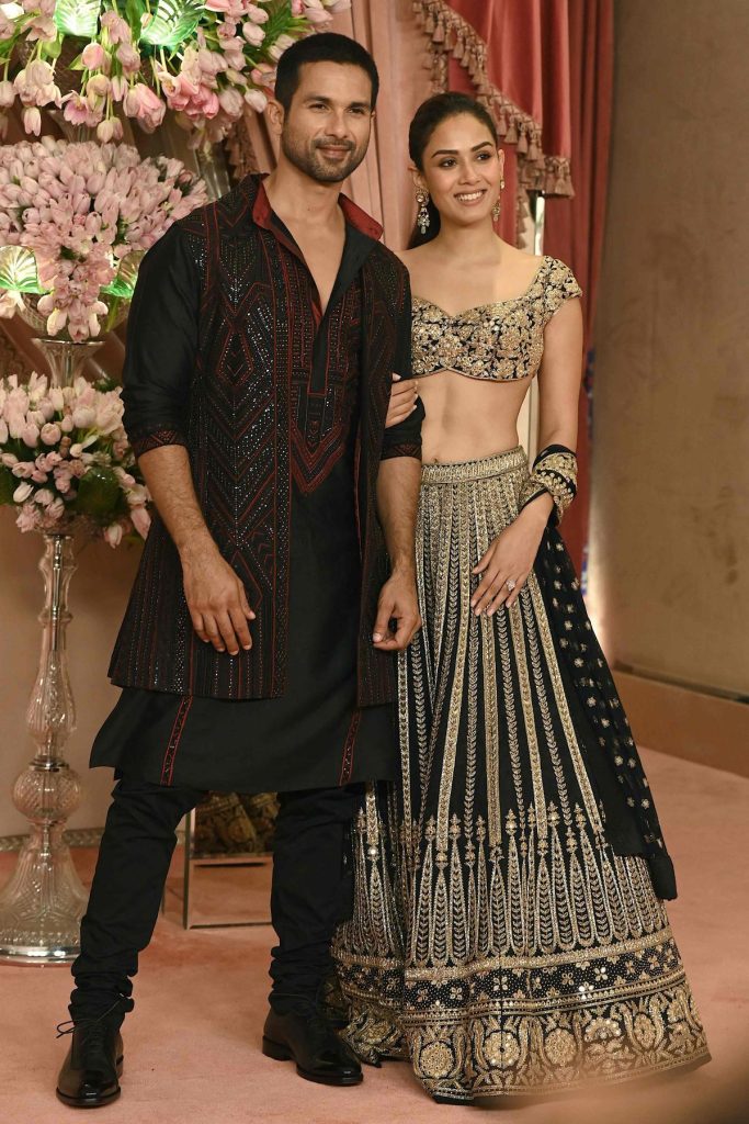 Meera Kapoor in a black lehenga with vertical motif work pattern